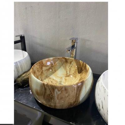 Lavabo sứ nghệ thuật vân đá tròn nâu GRL VD03
